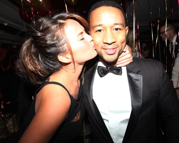 Chrissy Teigen kissing John Legend